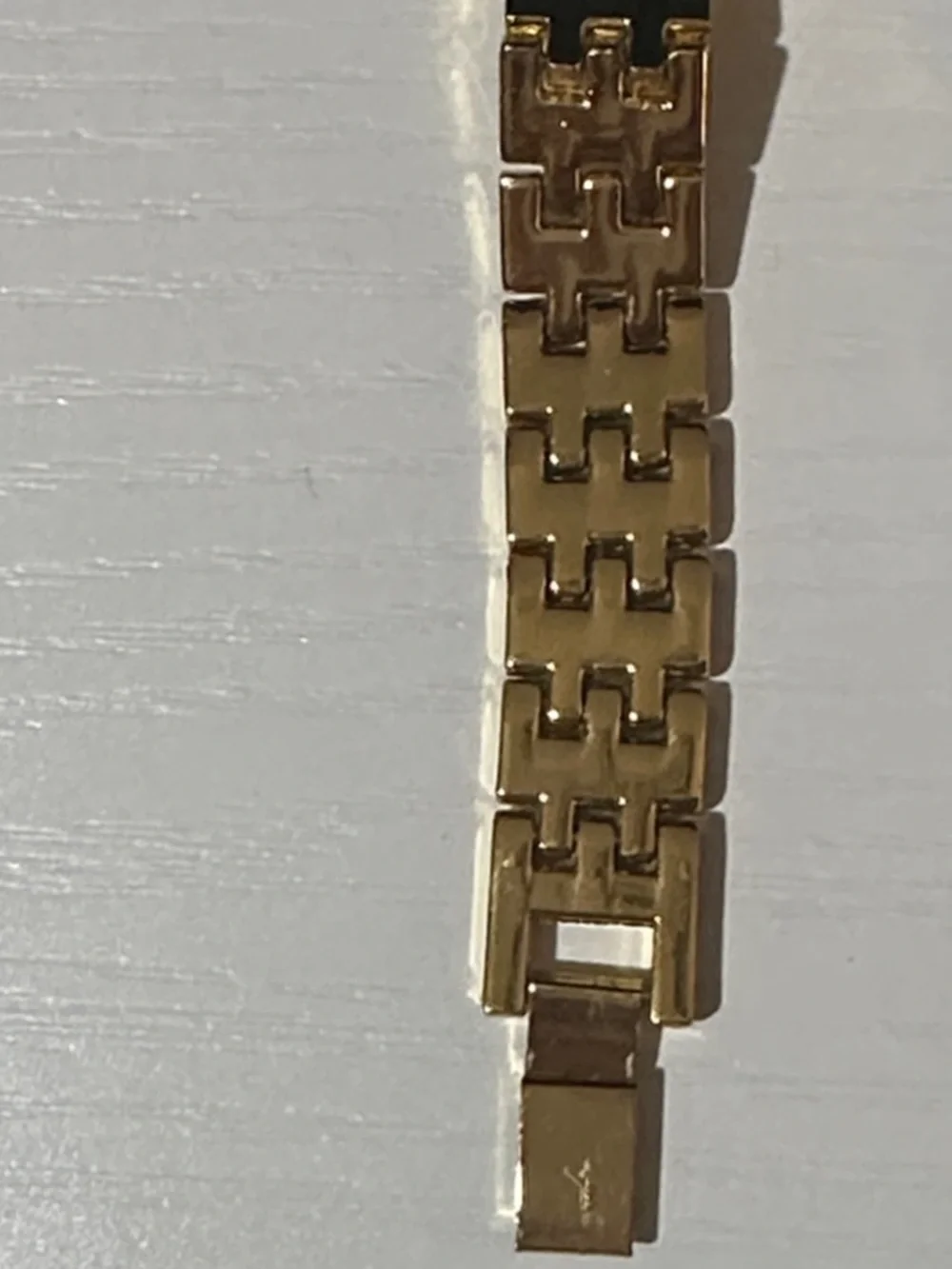 Elegant Gold-Tone Women's Crystal Bezel Watch with Blue Hands
